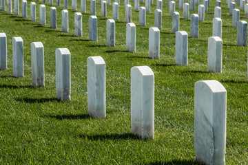 Tombstones in rows at Fort Rosecrans National Cemetery in San Diego, California. 