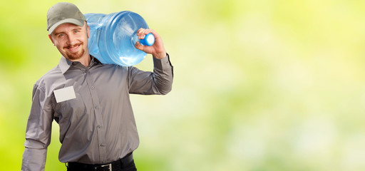 Naklejka premium Man with a bottle of drinking water.