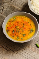 Dal Indian lentil curry soup with rice on side