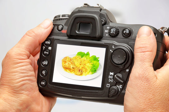 Photo of isolated food on camera display during session. Making stock photography.