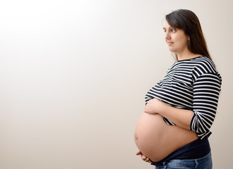 Calm expecting woman with copy space