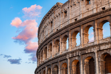 Fototapeta premium Colosseum at sunset in Rome, Italy