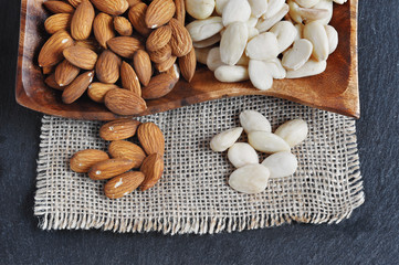 Fototapeta na wymiar Peeled almonds and blanched Almond.