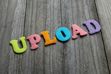 upload text on wooden background