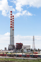 Power Plant and cloudy blue sky 