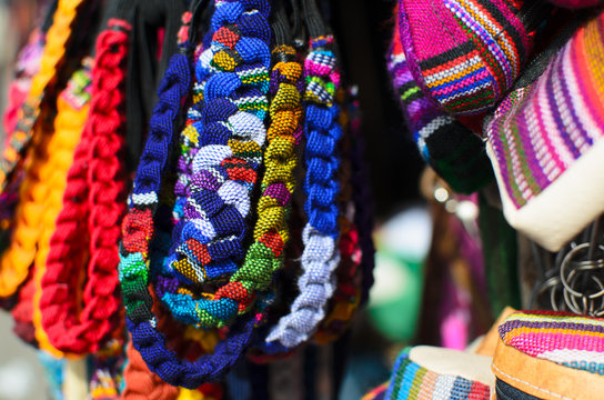 Numerous wristbands with Guatemala sing at the craft market 