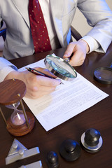 Notary signs the documents from our office