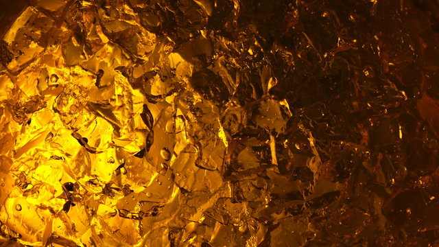 Abstract surface with amber colors internal lighting

