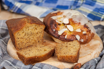 Fototapeta na wymiar Homemade banana bread sliced on a table . rustic style