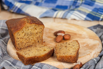 Homemade banana bread sliced on a table . rustic style