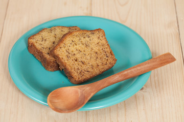 Homemade banana bread sliced on a table . rustic style