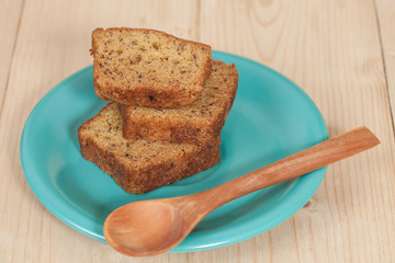 Homemade banana bread sliced on a table . rustic style