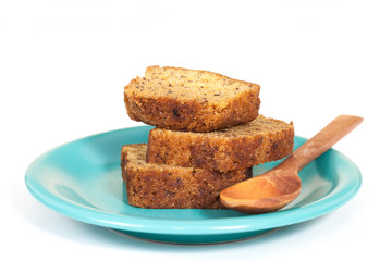 Homemade banana bread sliced on white background