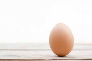 Close up egg on the wood and white background with clipping path 
