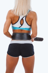 Fototapeta na wymiar Blond fitness woman's back.