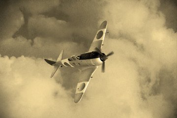 'Vintage style'  Wolrd War 2 Japanese fighter plane in the clouds