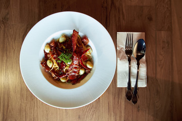 Spaghetti bacon and fried chillies
