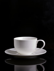 cup of coffee on a black background
