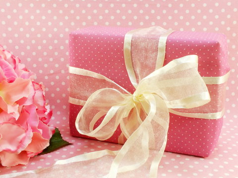 present gift box and flowers artificial bouquet
