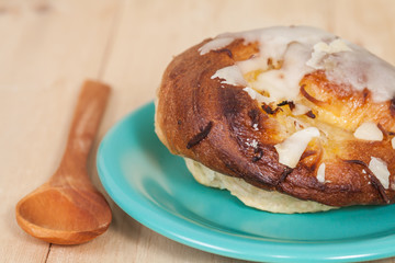 coconut bread in a plate on wood table