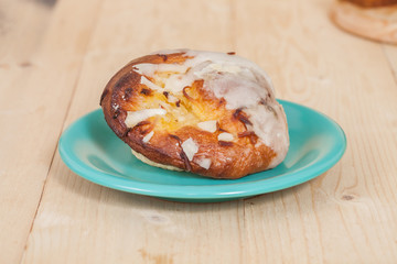 coconut bread in a plate on wood table