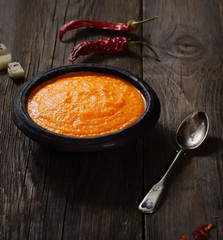 soup puree of carrots on a wooden background