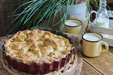 Homemade pie stuffed with potato and mushrooms