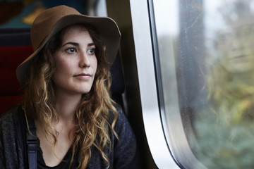 Young woman travelling on train