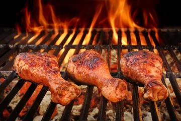 Foto op Canvas BBQ Chicken Legs Roasted On Hot Charcoal Grill © Alex