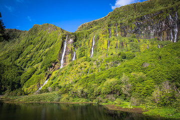 Fototapeta na wymiar Azores landscape in Flores island. Waterfalls in Pozo da Alagoin