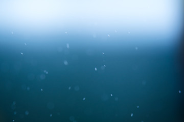 blured floating bubble on blue background