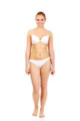 Young sporty woman in white underwear