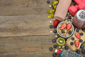Items for sports on a wooden background
