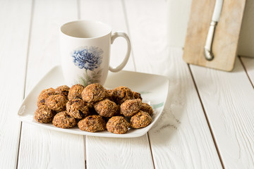 Tasty Gluten Free Apple Cookies with Black English Tea on Light White Wooden Background