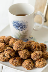 Tasty Gluten Free Apple Cookies with Black English Tea on Light White Wooden Background, Vertical, Close-up