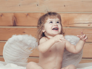 Boy in angel wings