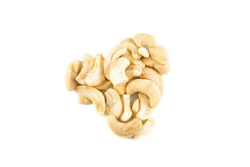 cashew nuts in a heart shape isolated on white background
