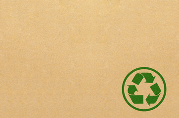 Recycle symbol painted on brown box