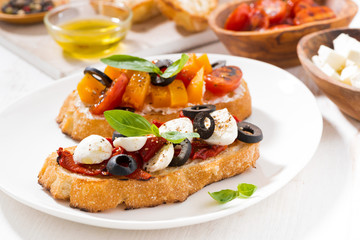 bruschettas with tomatoes and mozzarella