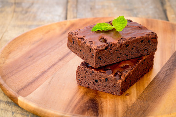 Fototapeta na wymiar chocolate brownies on wooden board