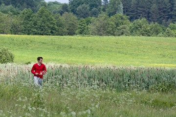 Fototapeta na wymiar Man in the meadow