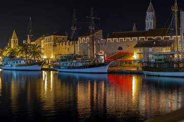 Fototapeta premium Trogir promenade at night, Croatia. / Photography is taken during night from main bridge in Trogir.