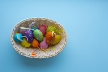 Easter eggs basket on blue