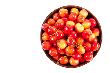 Ripe sweet cherries in a bowl.