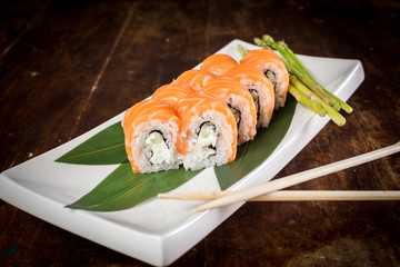 sushi on wooden table