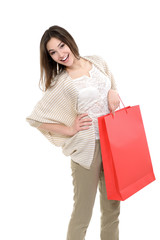 beautiful happy girl shopaholic with red shopping bags, over whi