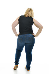 Obraz premium Overweight young woman, full length portrait, back view, over wh