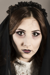 Dead widow in grief. Dark Beautiful Gothic Princess.Halloween party. Young beautiful demonic female