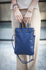 woman with nice blue handbag