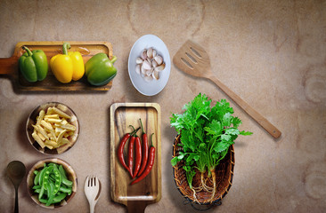 Vegetarian cooking creative concept home with fresh vegetables and healthy wooden top view a copy of the area, Thailand.